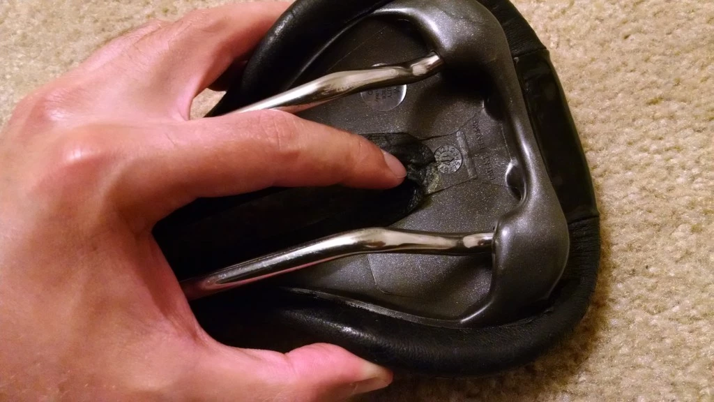 bike saddle - the terry fly's cover is secured to the shell with glue, which means...