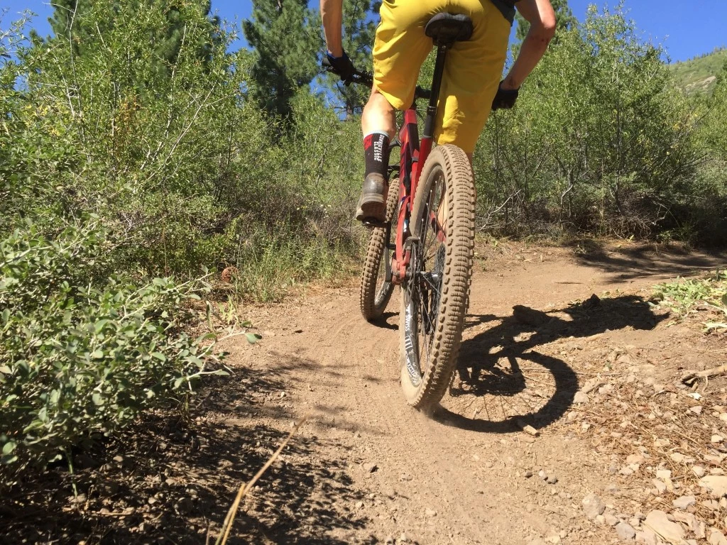 mountain bike tires - semi-slick tires have lower profile treads in the center to decrease...