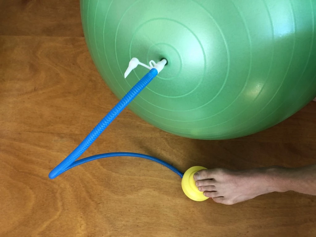 exercise ball - filling a ball with an included foot pump is a lot easier than using...