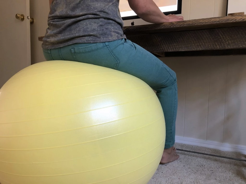 exercise ball - for sitting at a desk, it is critical to have a solid and supportive...