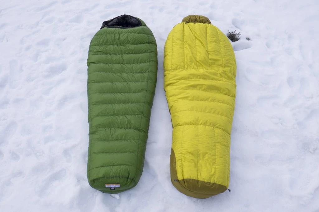 sleeping bag cold weather - the western mountaineering versalite (left) is two pounds lighter...