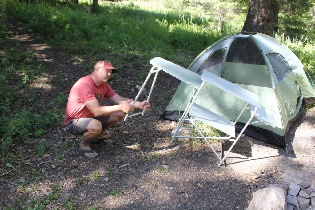 camping table - we weren't very nice. we pushed, twisted, yanked, forced, and much...