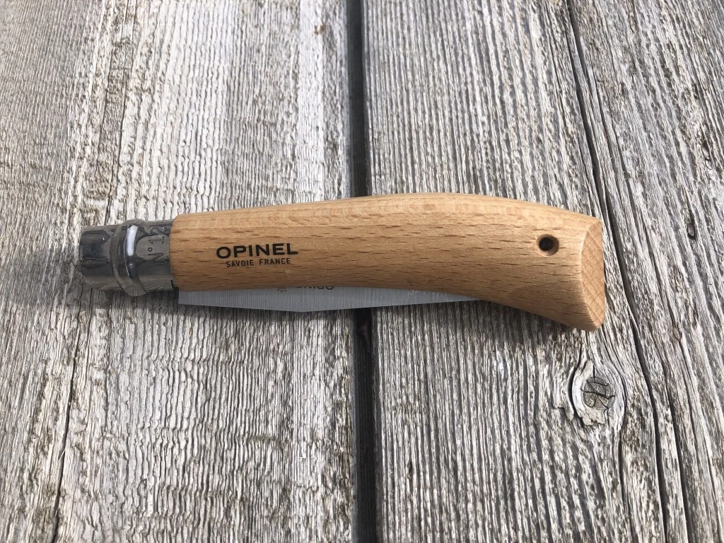 folding saw - the high quality of the opinel with its french beechwood handle and...