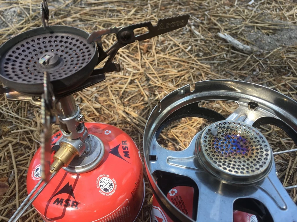 backpacking stove - the business end of the piezo igniter on the windmaster (left) is...