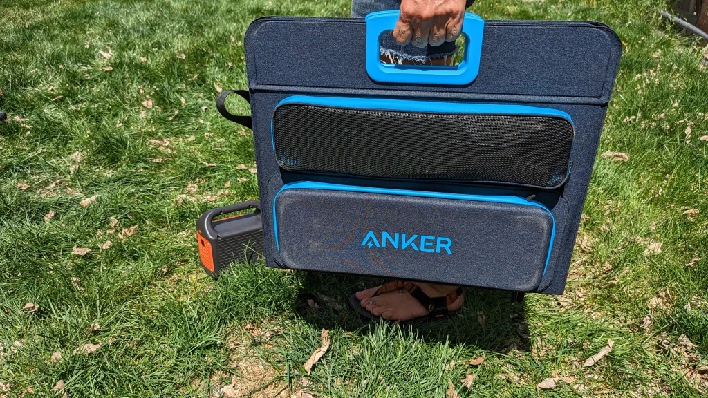 solar camping - the anker 625 folds into a small size and has an integrated handle...